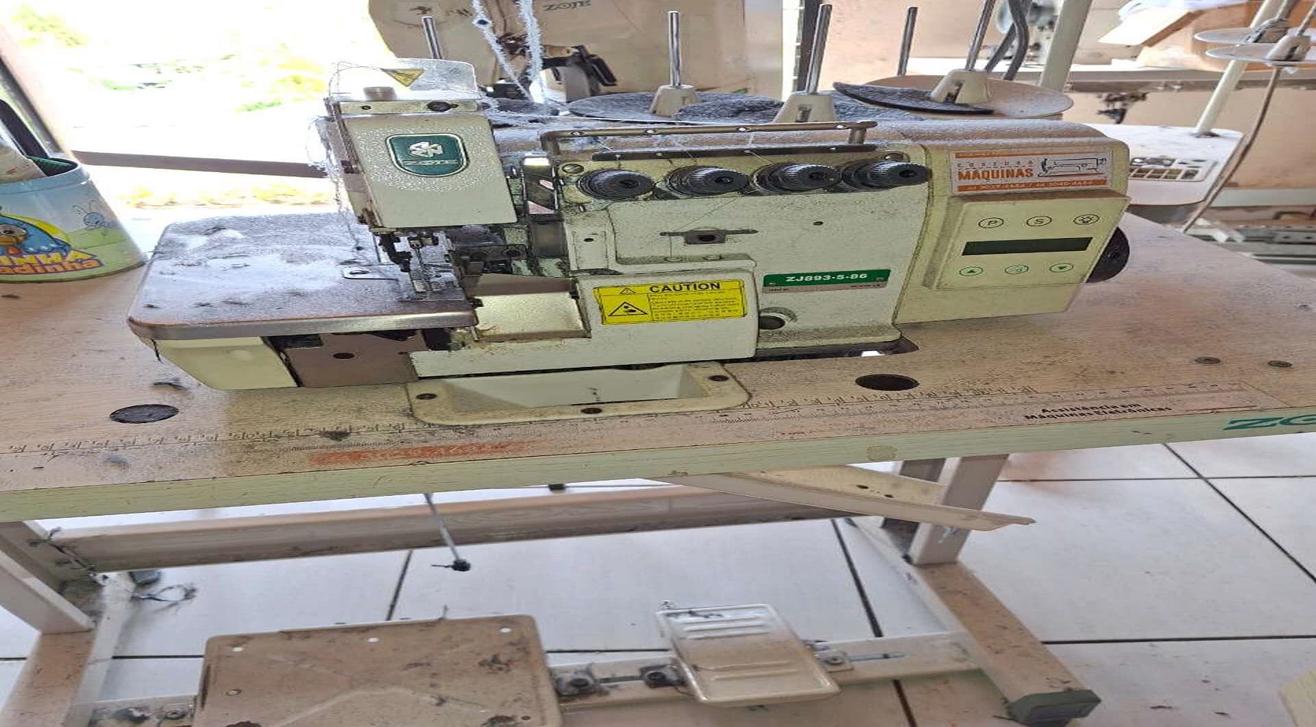 01 máquina de costura interlock, marca Zoje - leilão judicial - Não informado BR - lance mínimo R$ 1.000